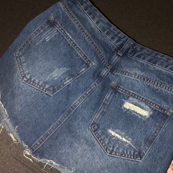 jean skirt with ripped patches - Picture 2 of 2